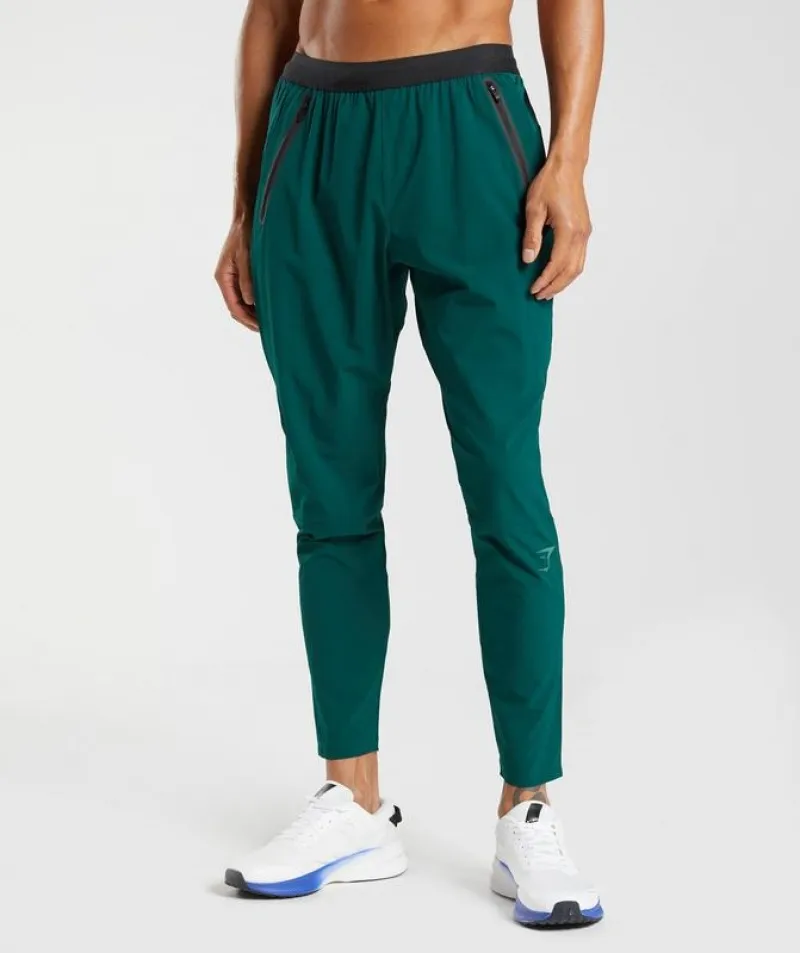 Pantalones Gymshark Híbrido Woven Joggers Verdes | 038469-MNI