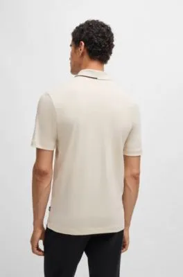 Polo de algodón interlock con cuello con cremallera