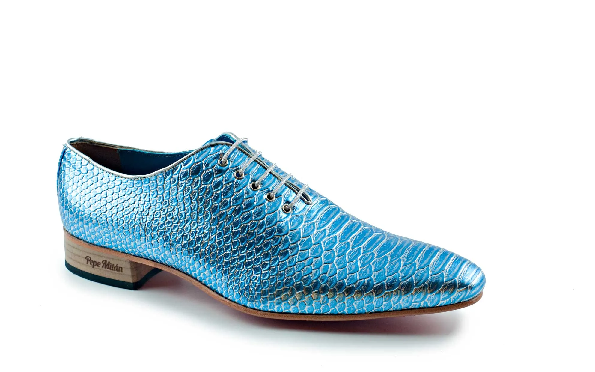 Zapato modelo Hypnotist, fabricado en toga snake metal azul. 